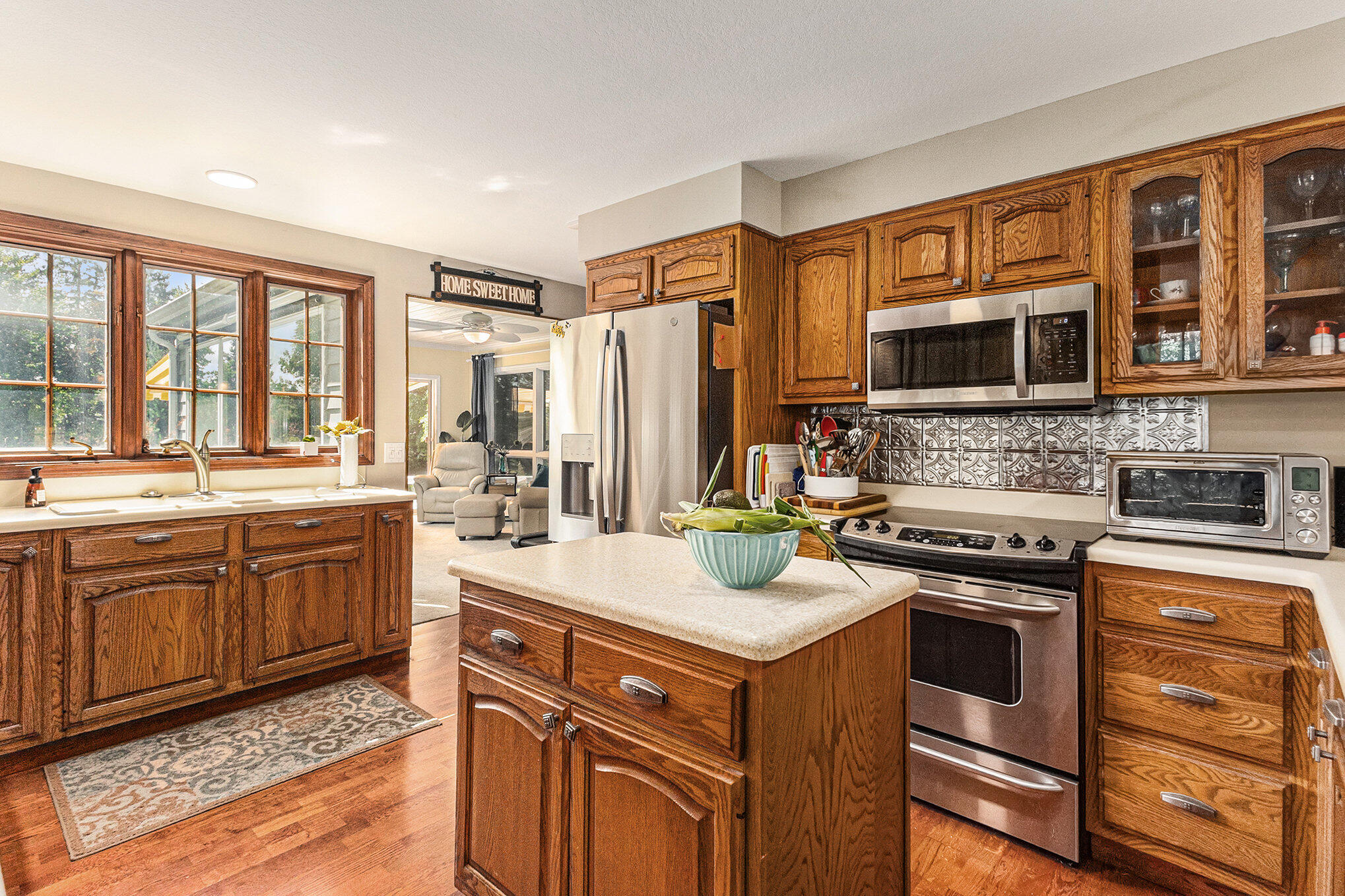 5925 West Jagger Road Ludington, MI 49431 - Photo 12 of 44 Kitchen, Sunroom beyond
