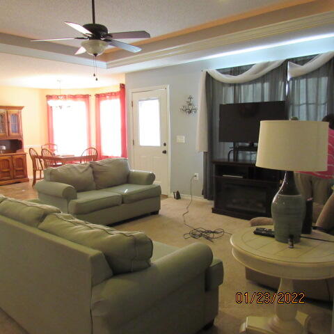 5816 Ester Terrace Crestview, FL 32539 - Photo 17 of 29 a living room with furniture or couch and a potted plant