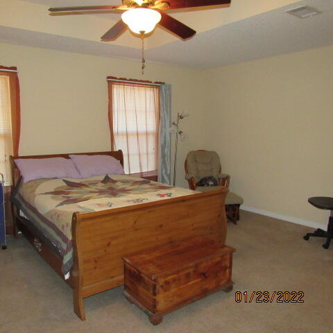5816 Ester Terrace Crestview, FL 32539 - Photo 20 of 29 a bedroom with a bed and window