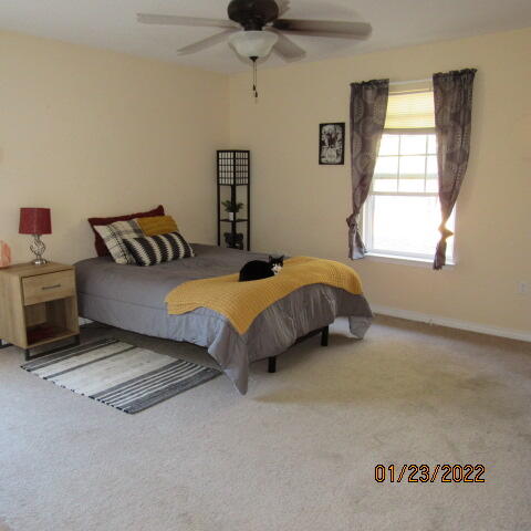 5816 Ester Terrace Crestview, FL 32539 - Photo 21 of 29 a bedroom with a bed and a window