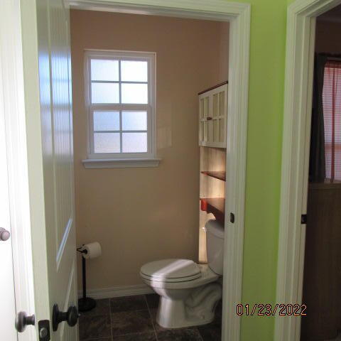 5816 Ester Terrace Crestview, FL 32539 - Photo 24 of 29 a bathroom with a toilet and a shower