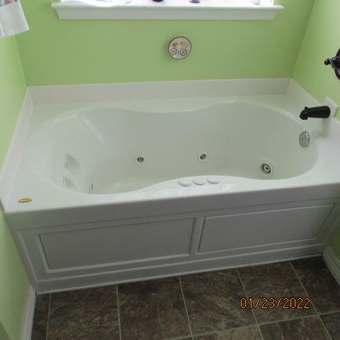5816 Ester Terrace Crestview, FL 32539 - Photo 26 of 29 a bathroom with a bathtub