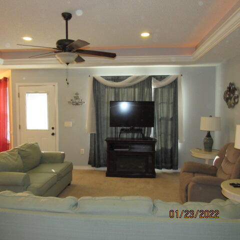 5816 Ester Terrace Crestview, FL 32539 - Photo 27 of 29 a living room with furniture and a flat screen tv