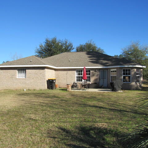 5816 Ester Terrace Crestview, FL 32539 - Photo 6 of 29 a view of a house with a swimming pool