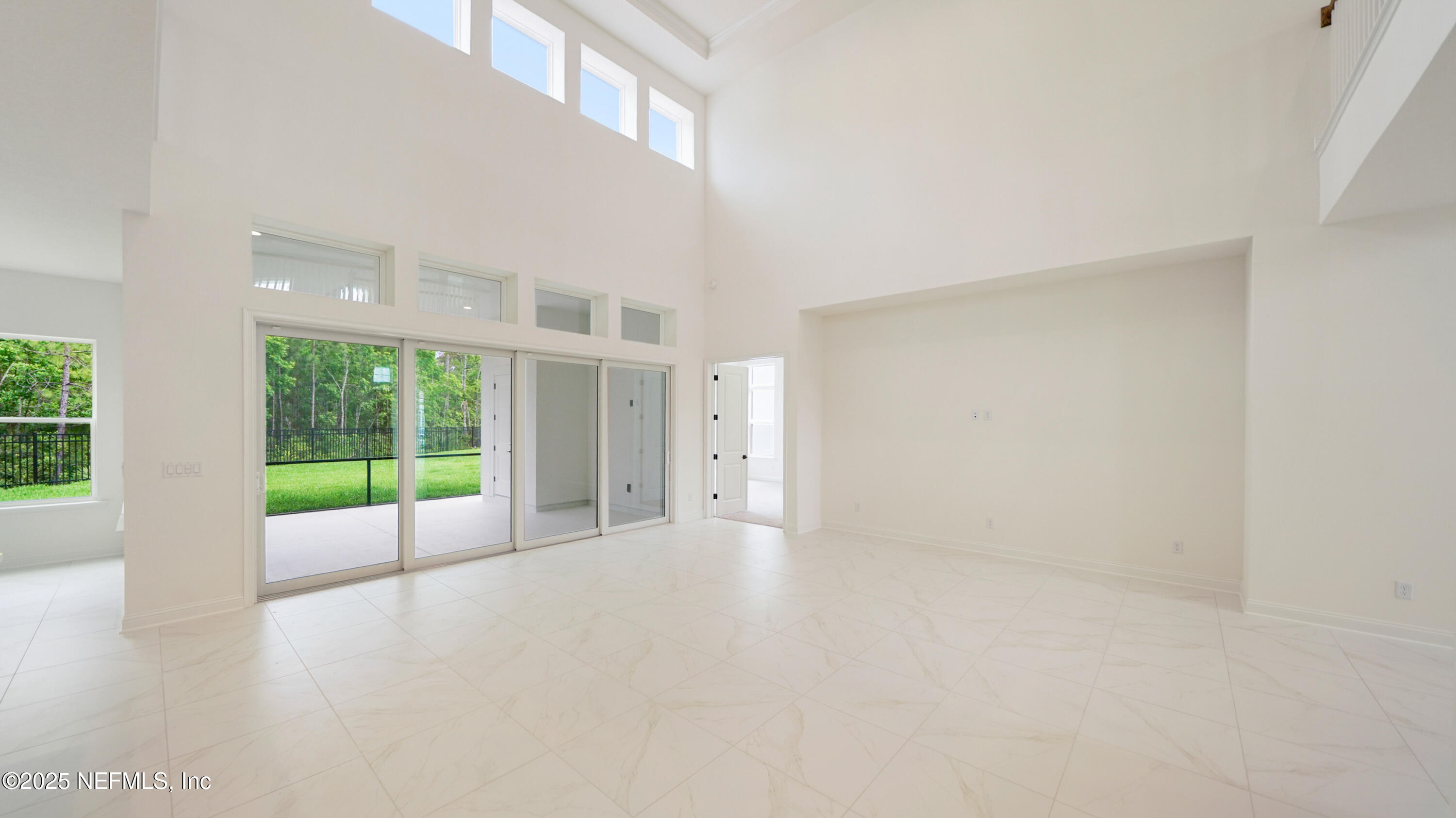 3137 Spiro Circle Jacksonville, FL 32246 - Photo 20 of 84 a view of an empty room with a window