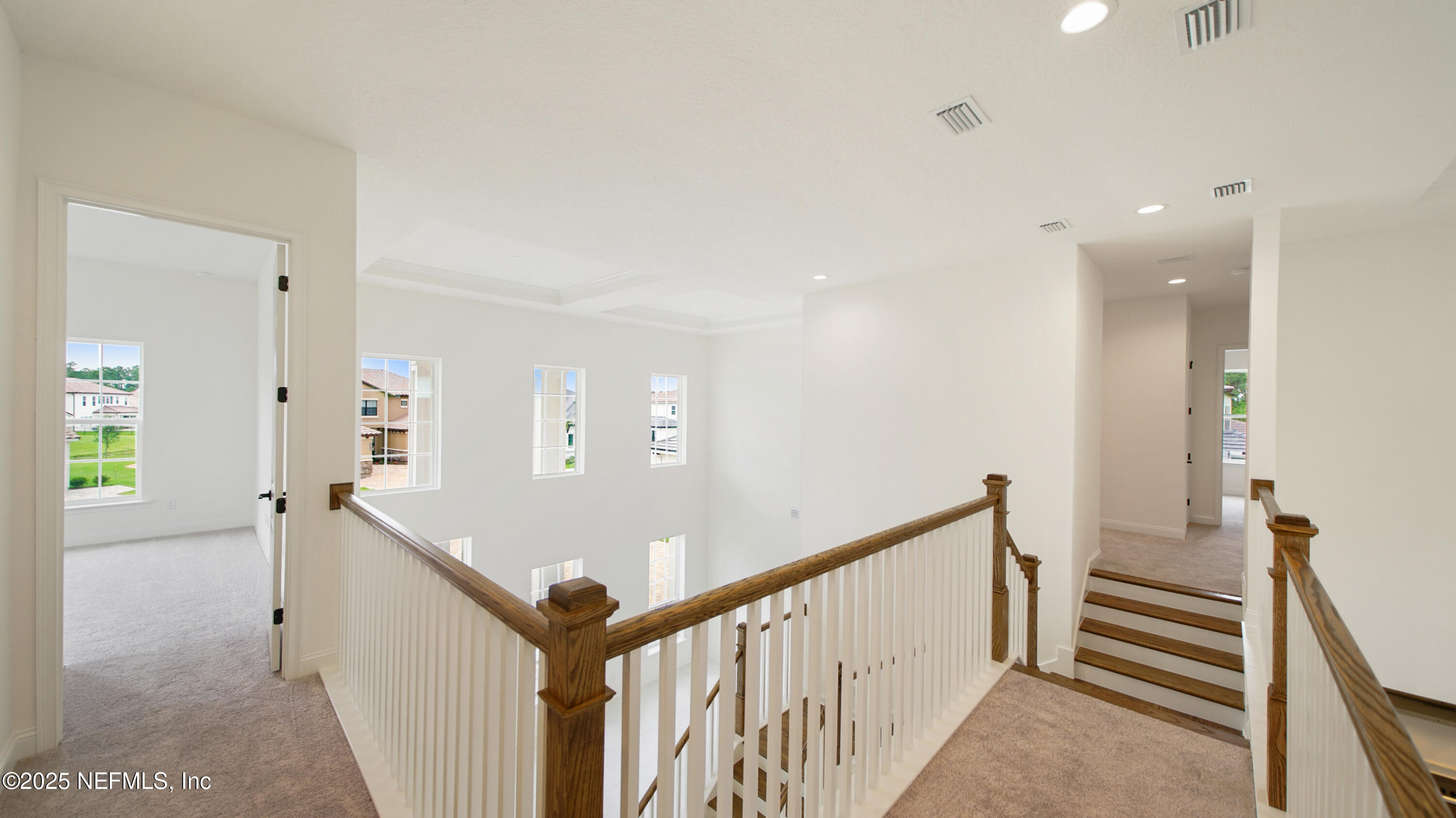 3137 Spiro Circle Jacksonville, FL 32246 - Photo 47 of 84 a view of a hallway with window and stairs