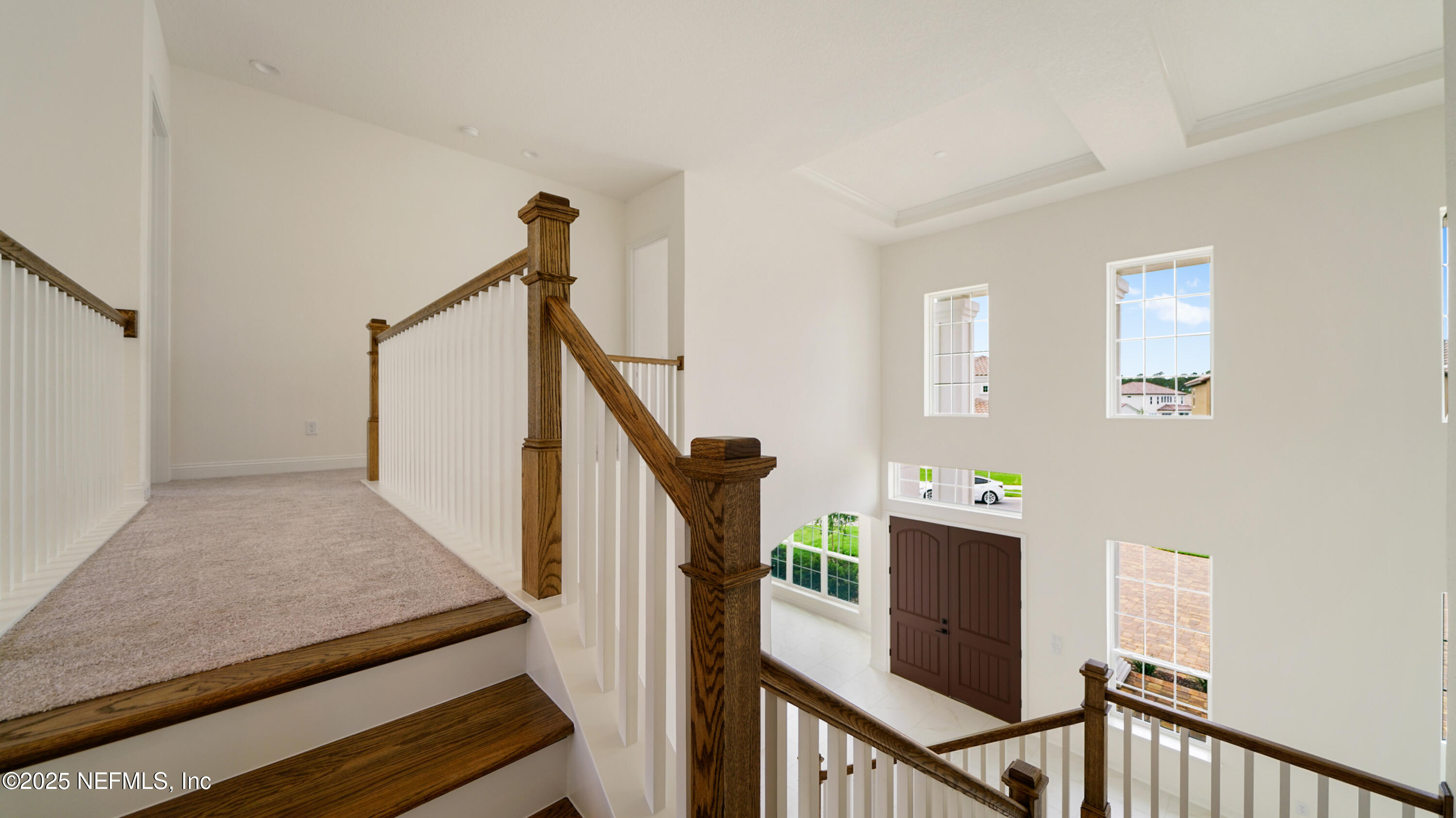 3137 Spiro Circle Jacksonville, FL 32246 - Photo 59 of 84 a view of a hallway with staircase