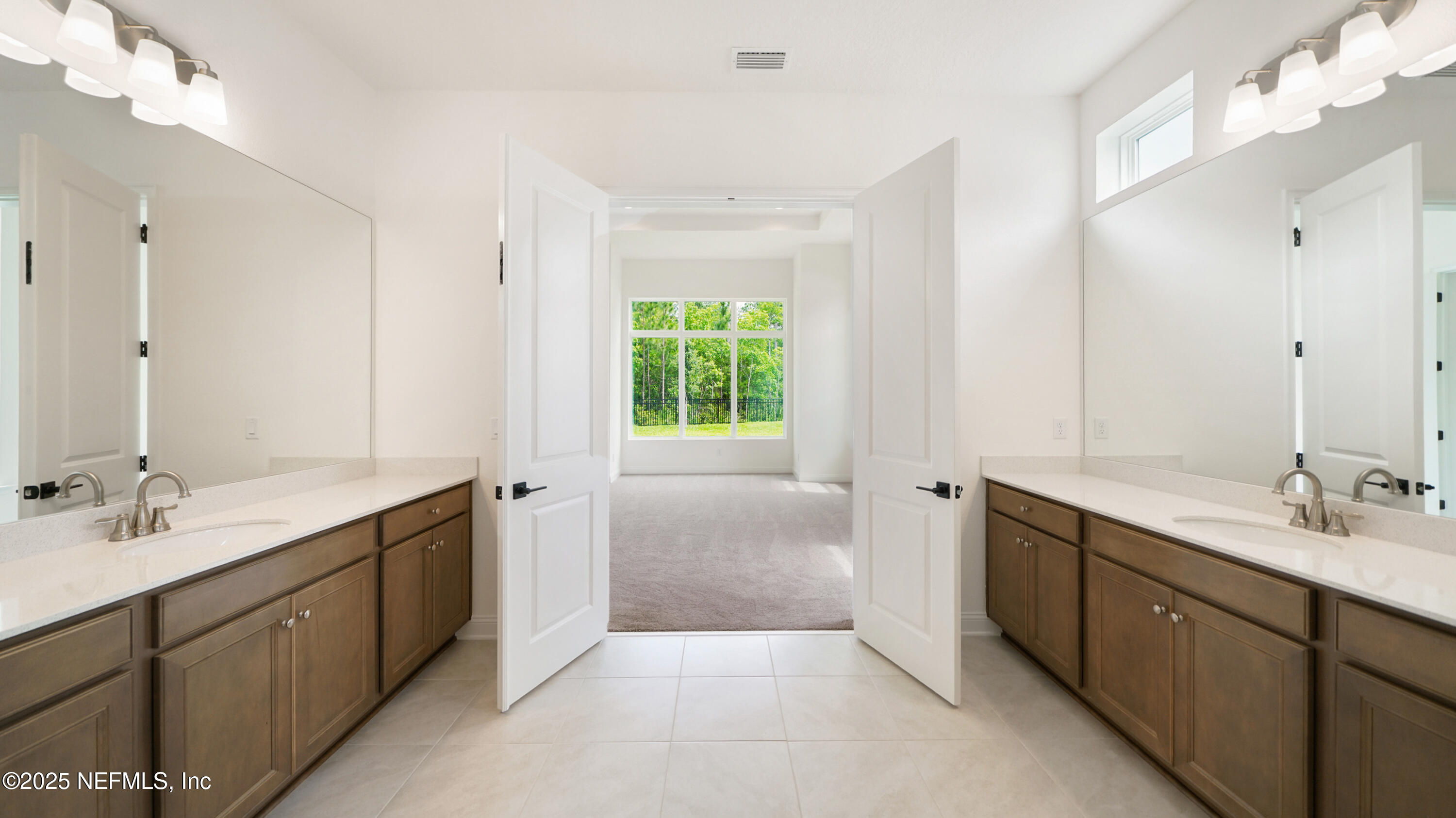 3137 Spiro Circle Jacksonville, FL 32246 - Photo 10 of 84 a spacious bathroom with a double vanity sink mirror and double