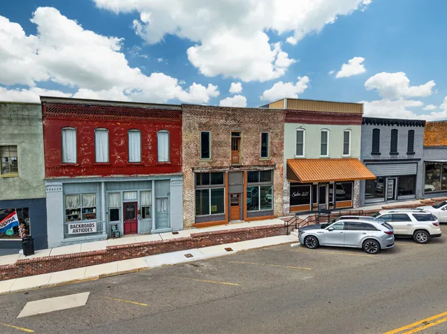 a car parked in front of a building