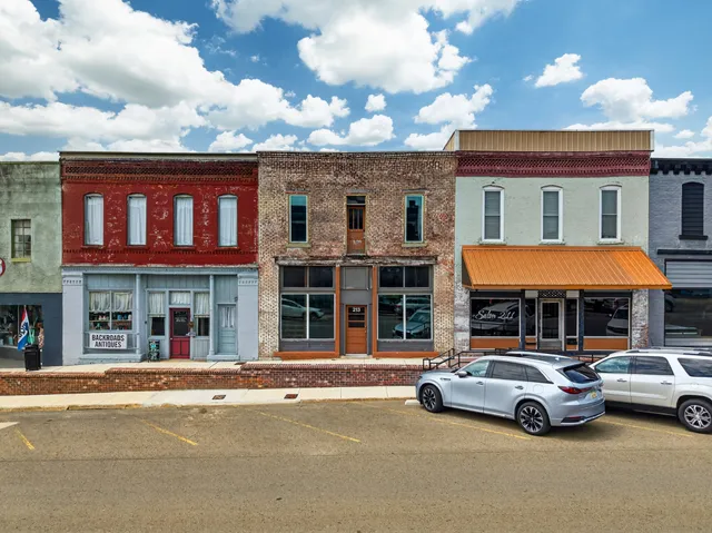 a car parked in front of a building