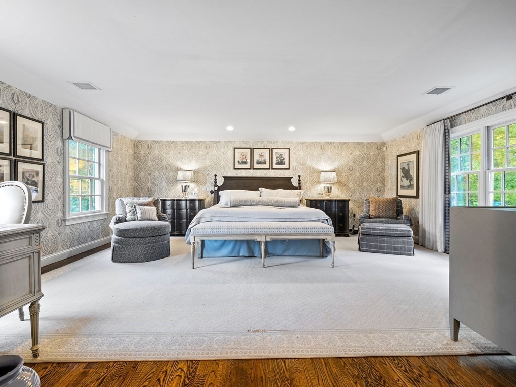 19 Radcliffe Road Wellesley, MA 02482 - Photo 12 of 21 a bedroom with a large bed and a couch