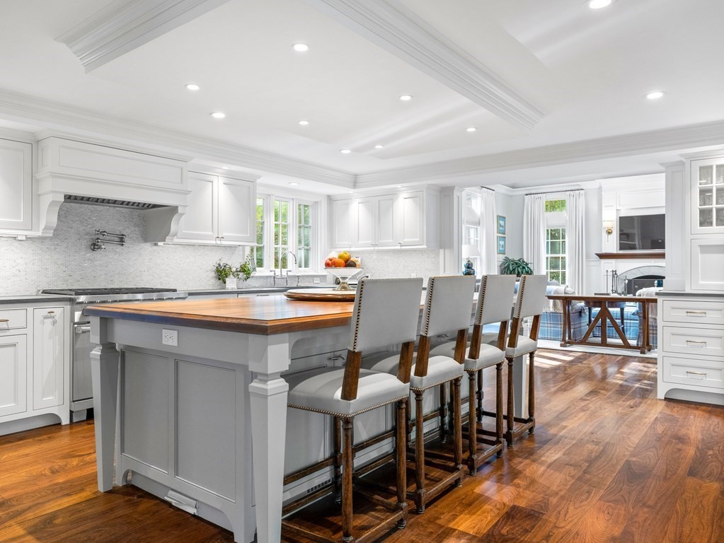 19 Radcliffe Road Wellesley, MA 02482 - Photo 3 of 21 a kitchen with a dining table chairs and view living room
