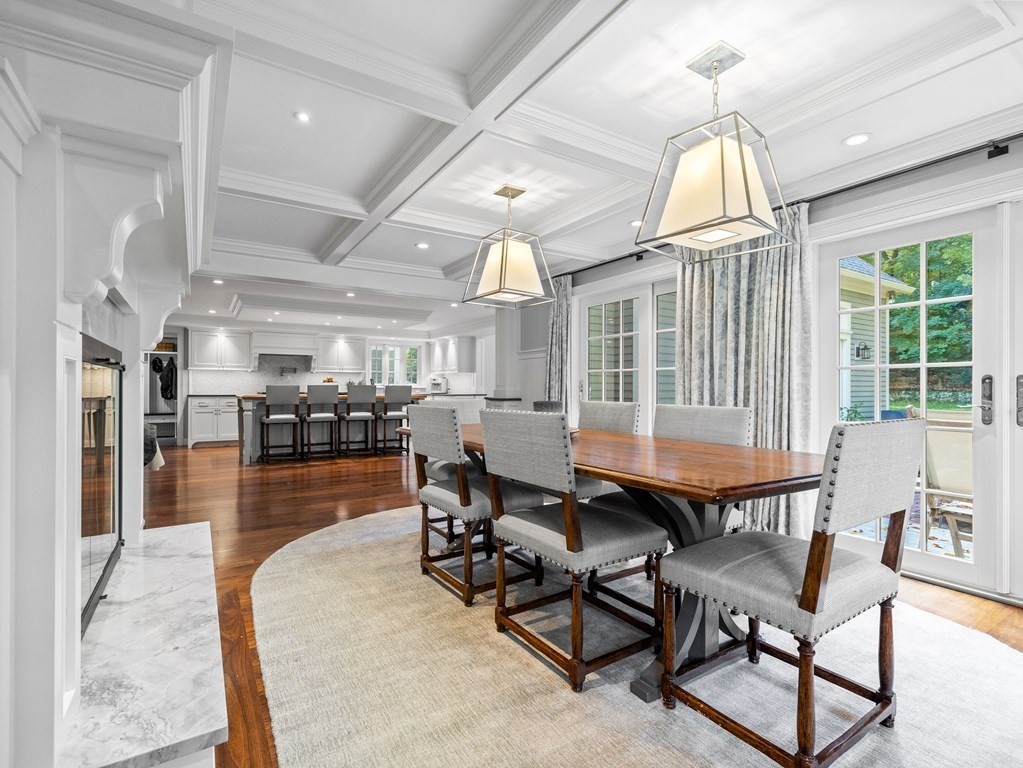 19 Radcliffe Road Wellesley, MA 02482 - Photo 7 of 21 a dining room with wooden floor and a chandelier
