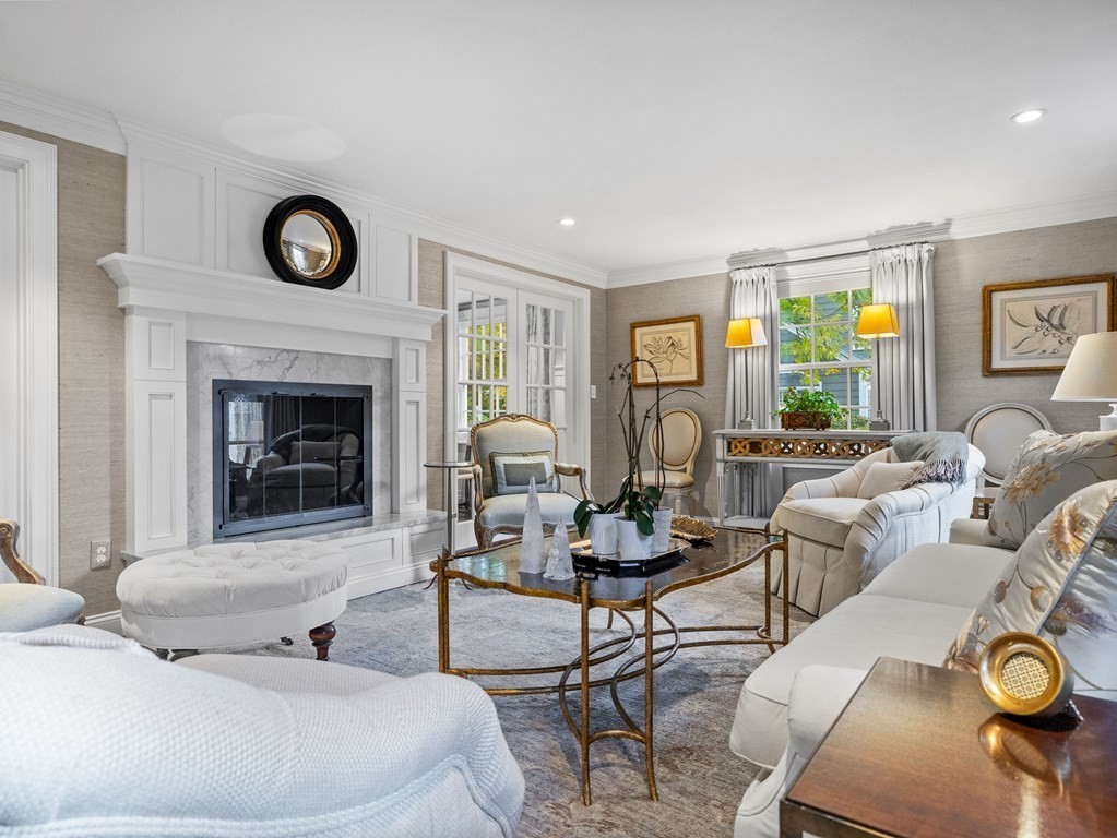19 Radcliffe Road Wellesley, MA 02482 - Photo 10 of 21 a living room with furniture and a fireplace