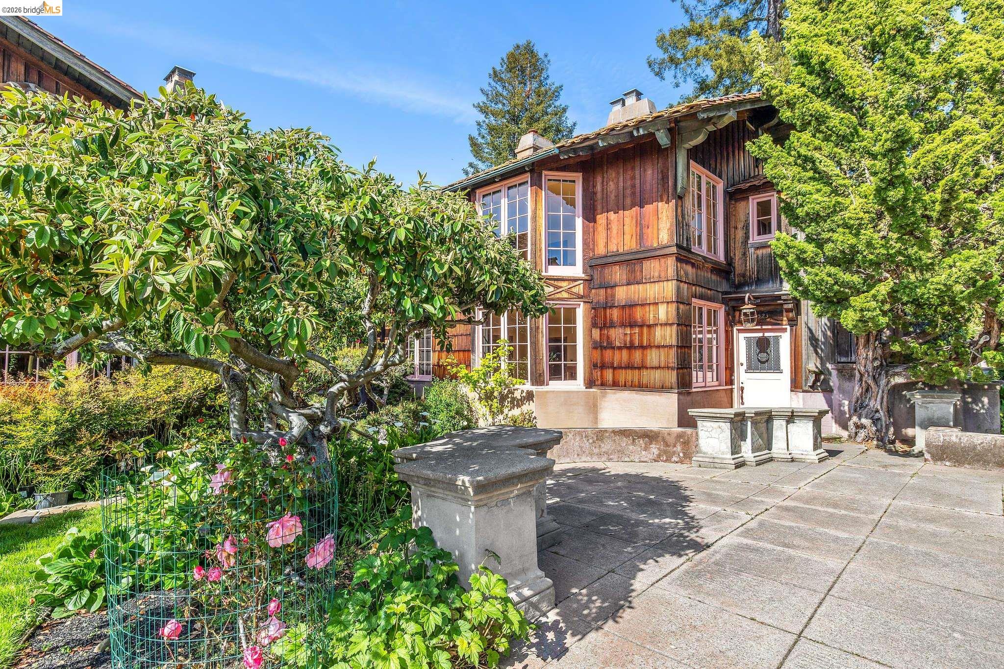 2501 Rose Walk Berkeley, CA 94708 - Photo 13 of 60 a front view of a house with a garden