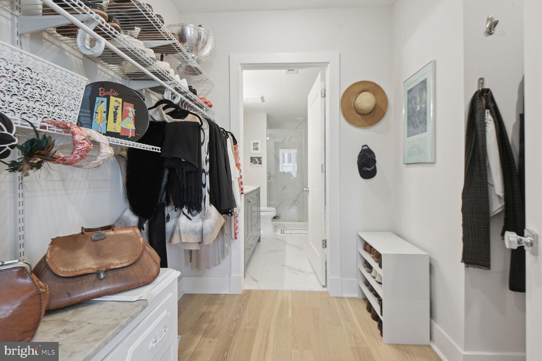 2717 Ontario Road Northwest, Unit 201 Washington, DC 20009 - Photo 9 of 15 Primary bedroom walk-in closet
