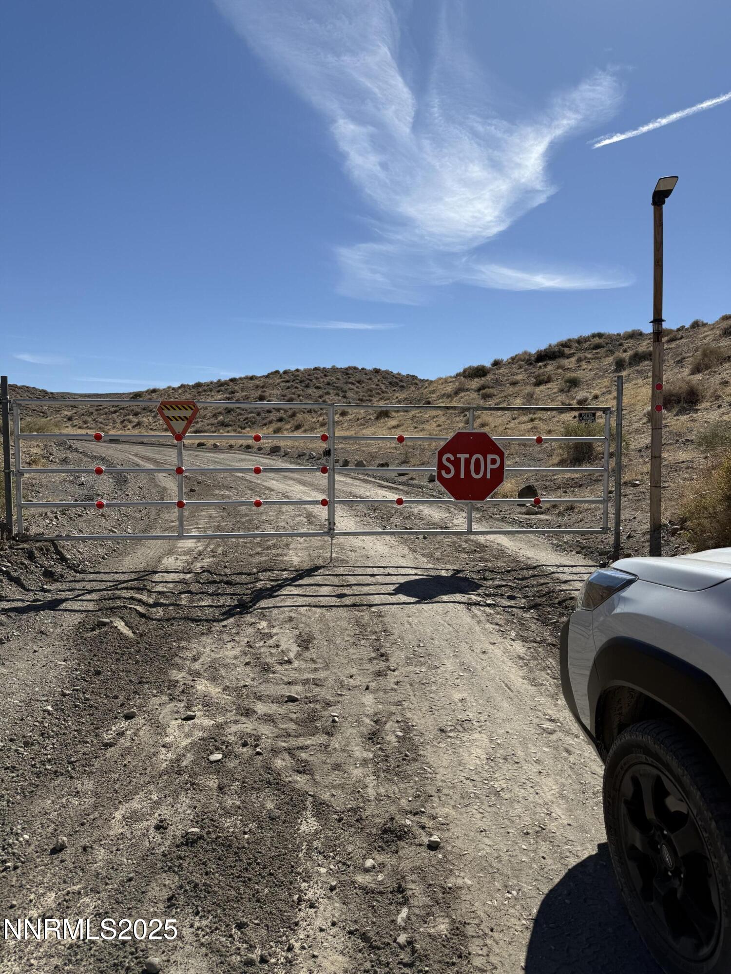 7785 Desert Shadows Lane Fernley, NV 89408 - Photo 14 of 21 a view of a parking space with city view