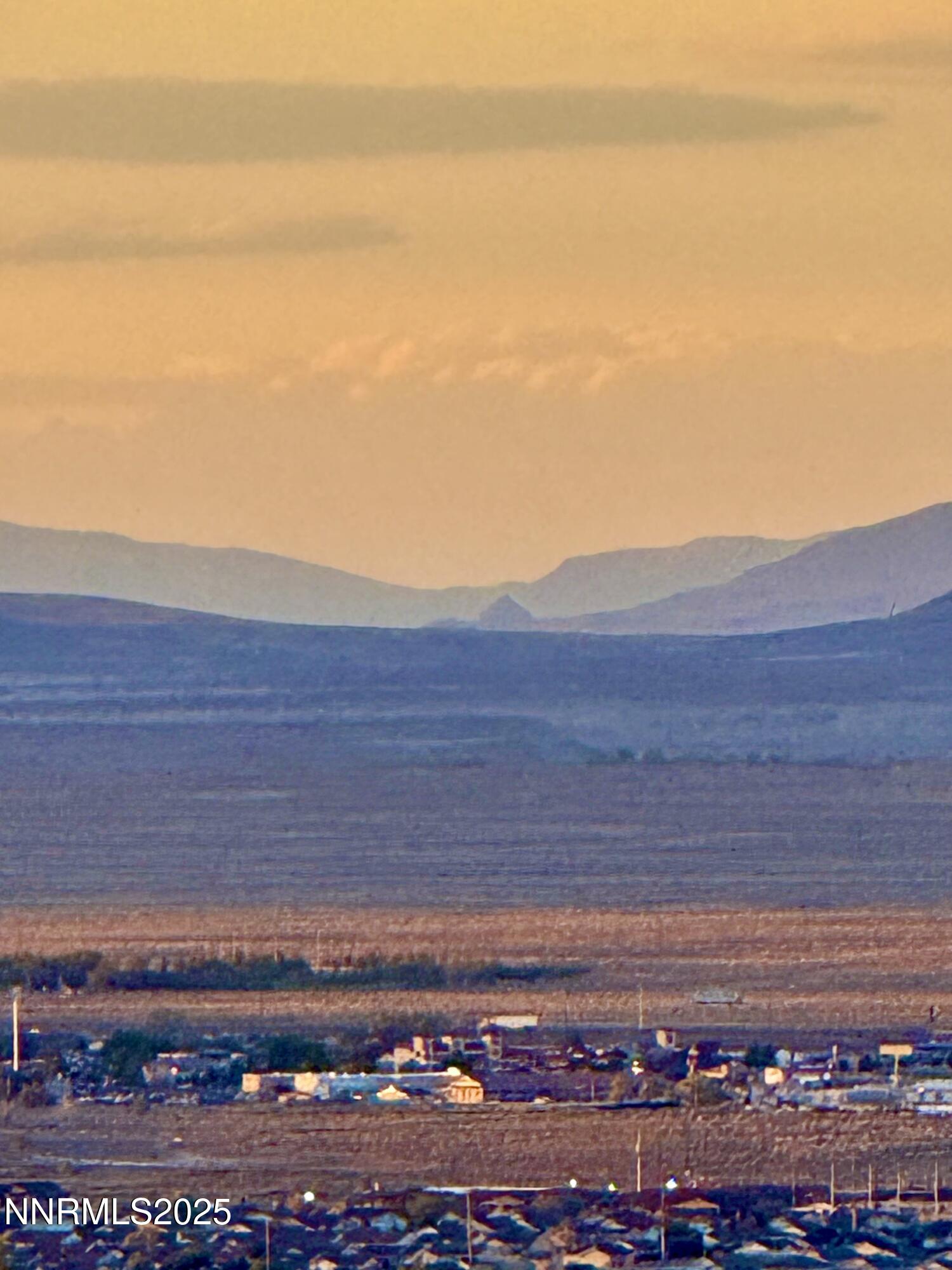 7785 Desert Shadows Lane Fernley, NV 89408 - Photo 17 of 21 a view of city and ocean