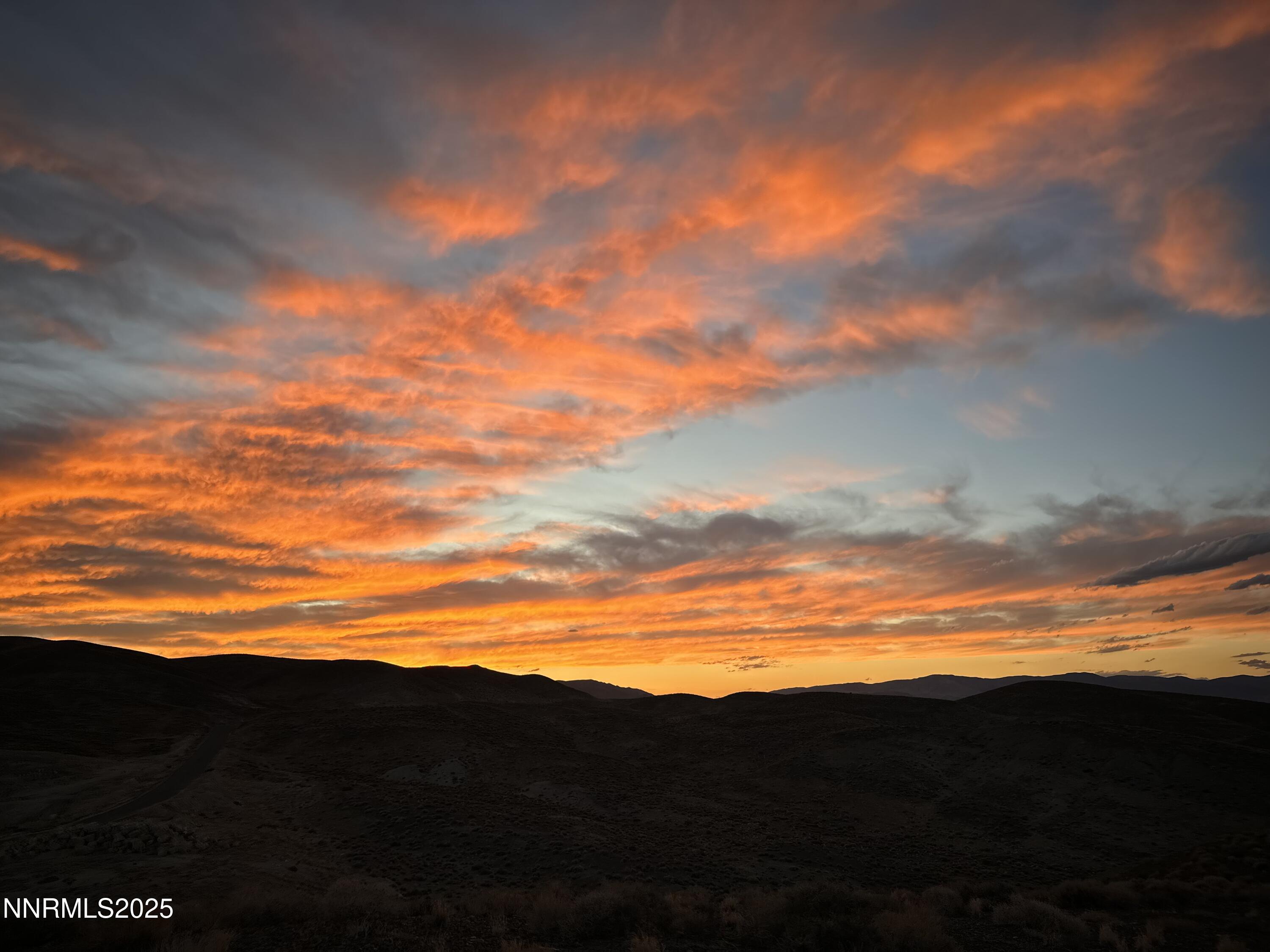 7785 Desert Shadows Lane Fernley, NV 89408 - Photo 20 of 21 a view of sunset