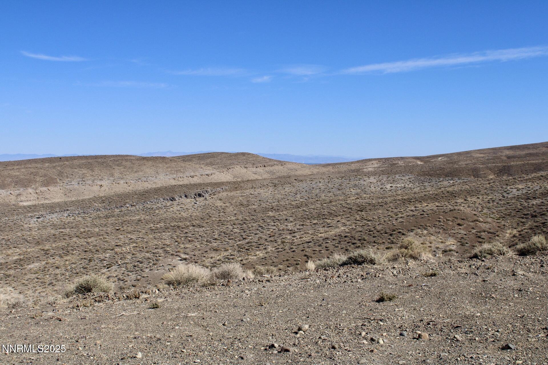 7785 Desert Shadows Lane Fernley, NV 89408 - Photo 4 of 21 a view of beach and ocean
