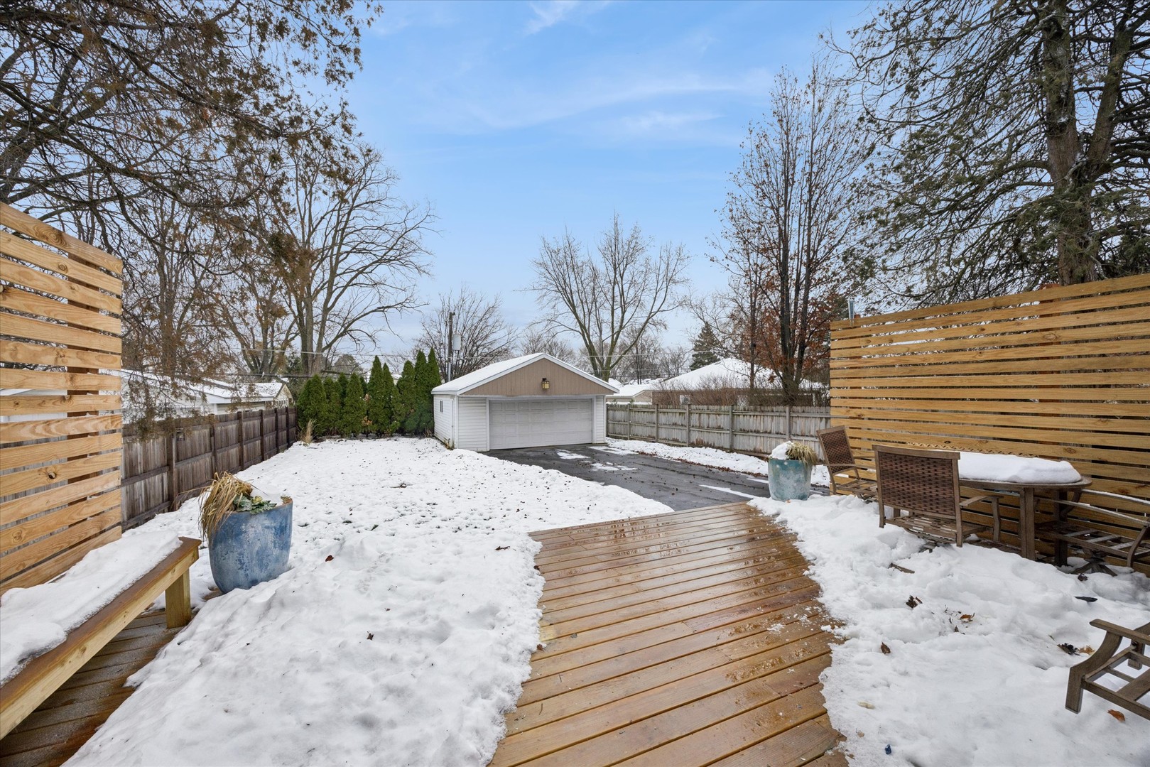 309 Clinton Avenue Elmhurst, IL 60126 - Photo 4 of 33 a view of a terrace with snow on the road