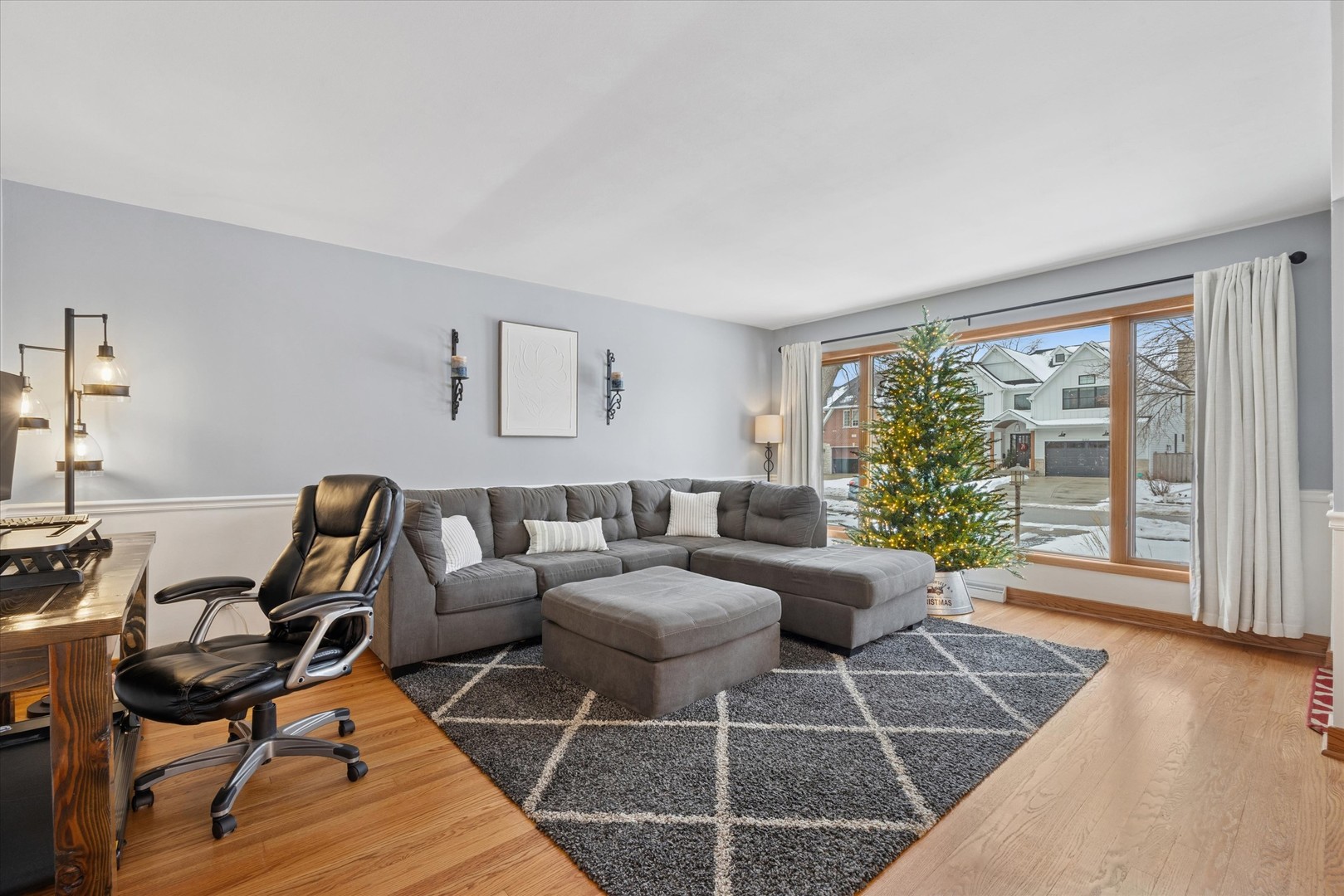 309 Clinton Avenue Elmhurst, IL 60126 - Photo 6 of 33 a living room with furniture and a window