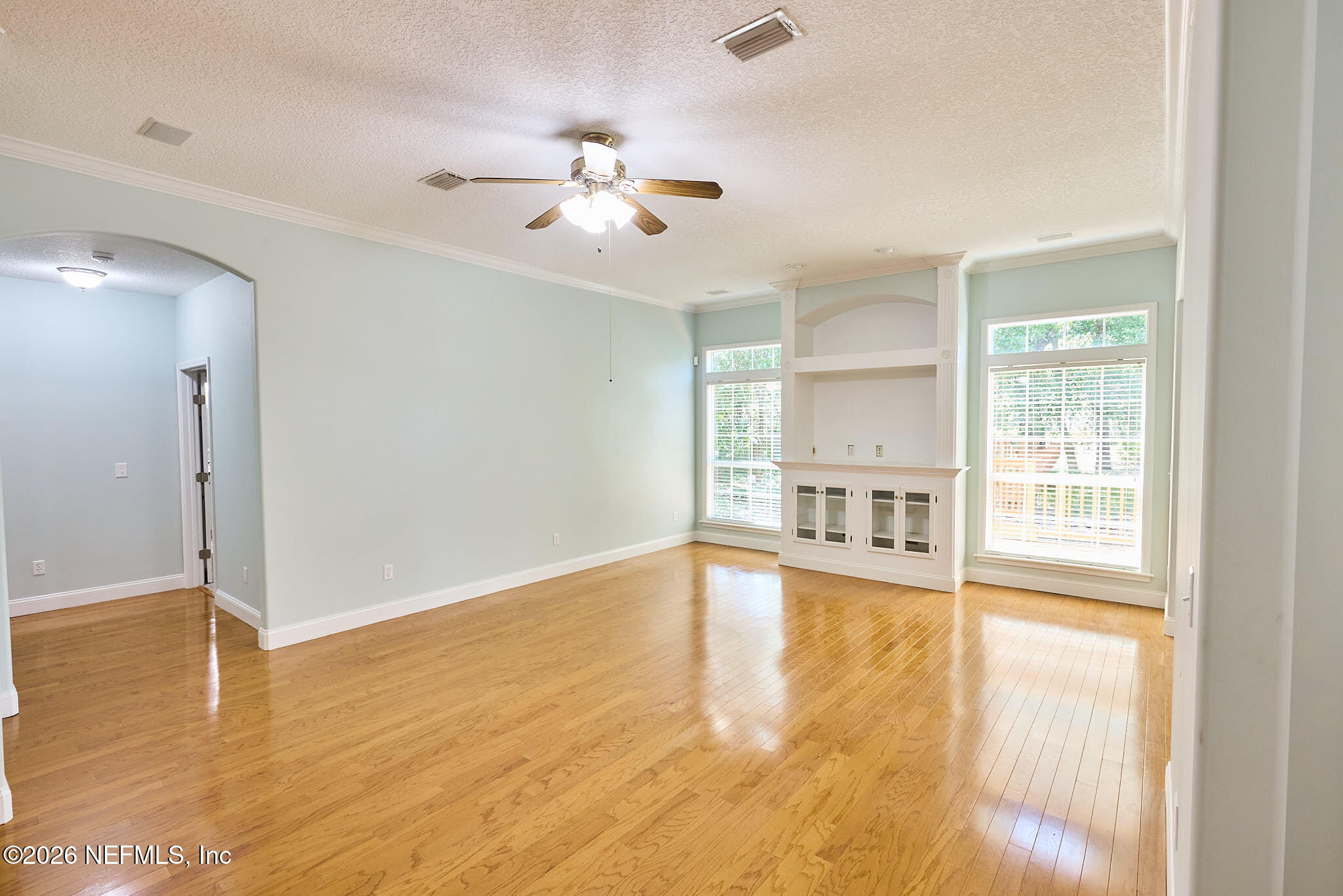 85404 Burmeister Road Fernandina Beach, FL 32034 - Photo 34 of 53 a view of an empty room with wooden floor and a window