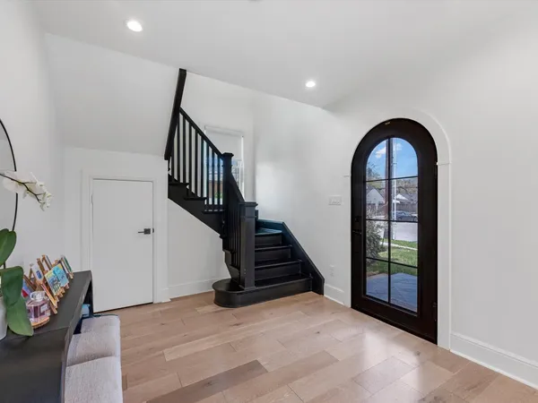 a large kitchen with stainless steel appliances kitchen island a large island in the center