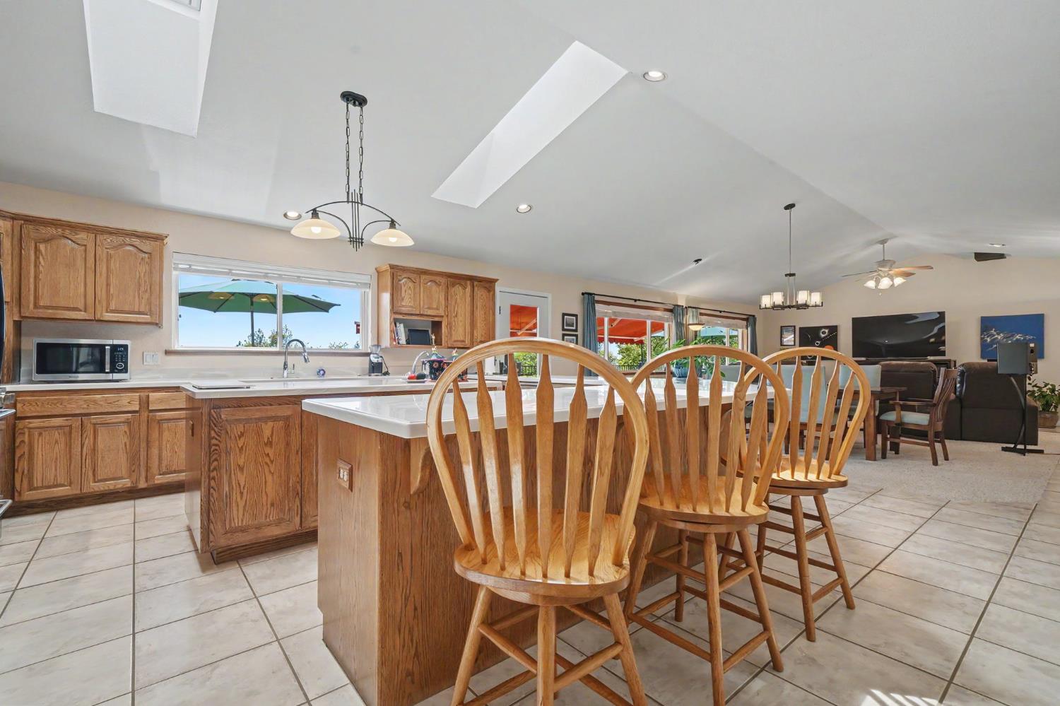 18299 West Clinton Road Jackson, CA 95642 - Photo 23 of 56 a view of a kitchen and dining area