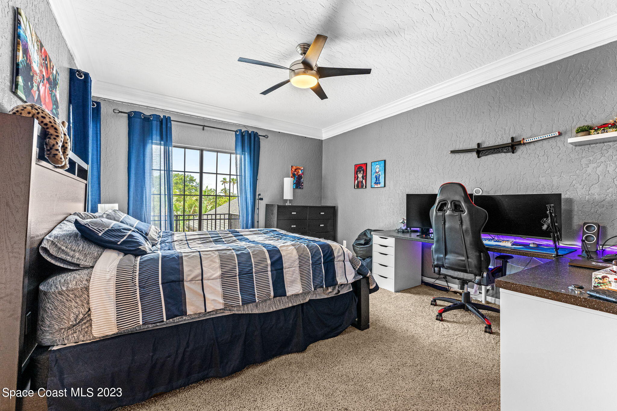 70 Lanternback Island Drive Satellite Beach, FL 32937 - Photo 15 of 26 a bed room with a bed and a window