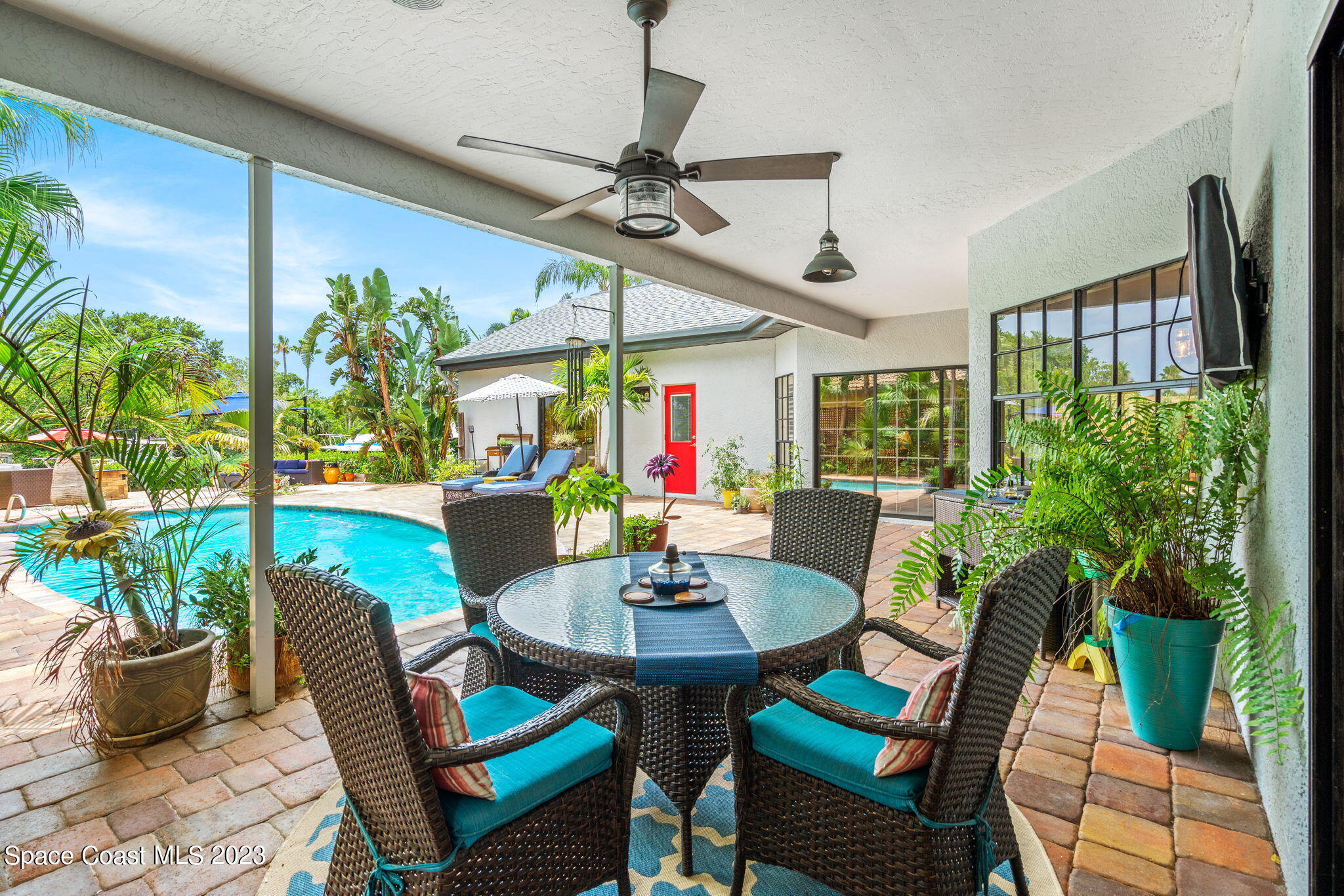 70 Lanternback Island Drive Satellite Beach, FL 32937 - Photo 17 of 26 a view of a dining room with furniture window and outside view