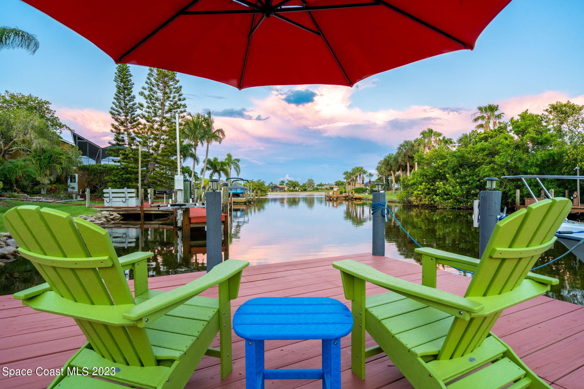 70 Lanternback Island Drive Satellite Beach, FL 32937 - Photo 2 of 26 a view of a chairs and table in the terrace