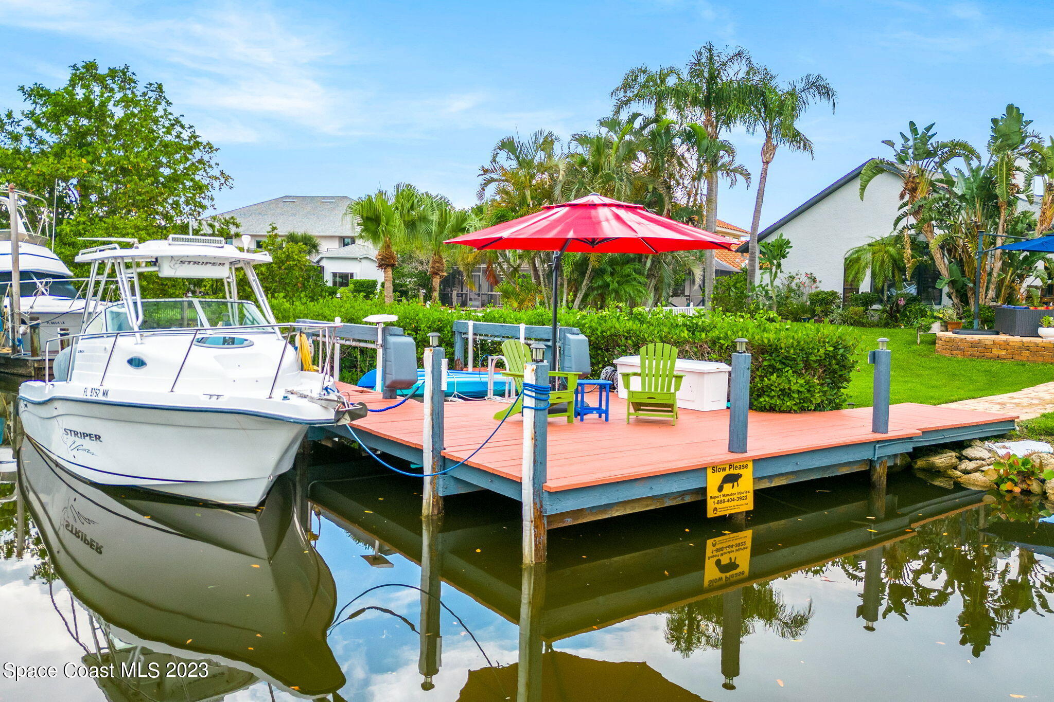 70 Lanternback Island Drive Satellite Beach, FL 32937 - Photo 22 of 26 a view of a patio with swimming pool