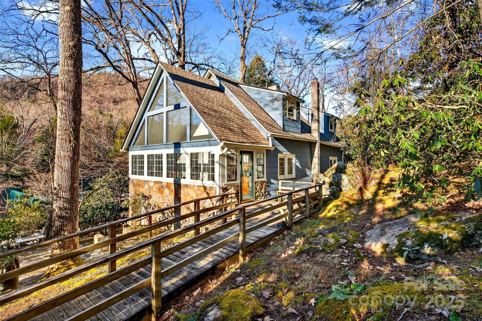 308 Texas Road Montreat, NC 28711 - Photo 1 of 48 a view of house with trees in the background