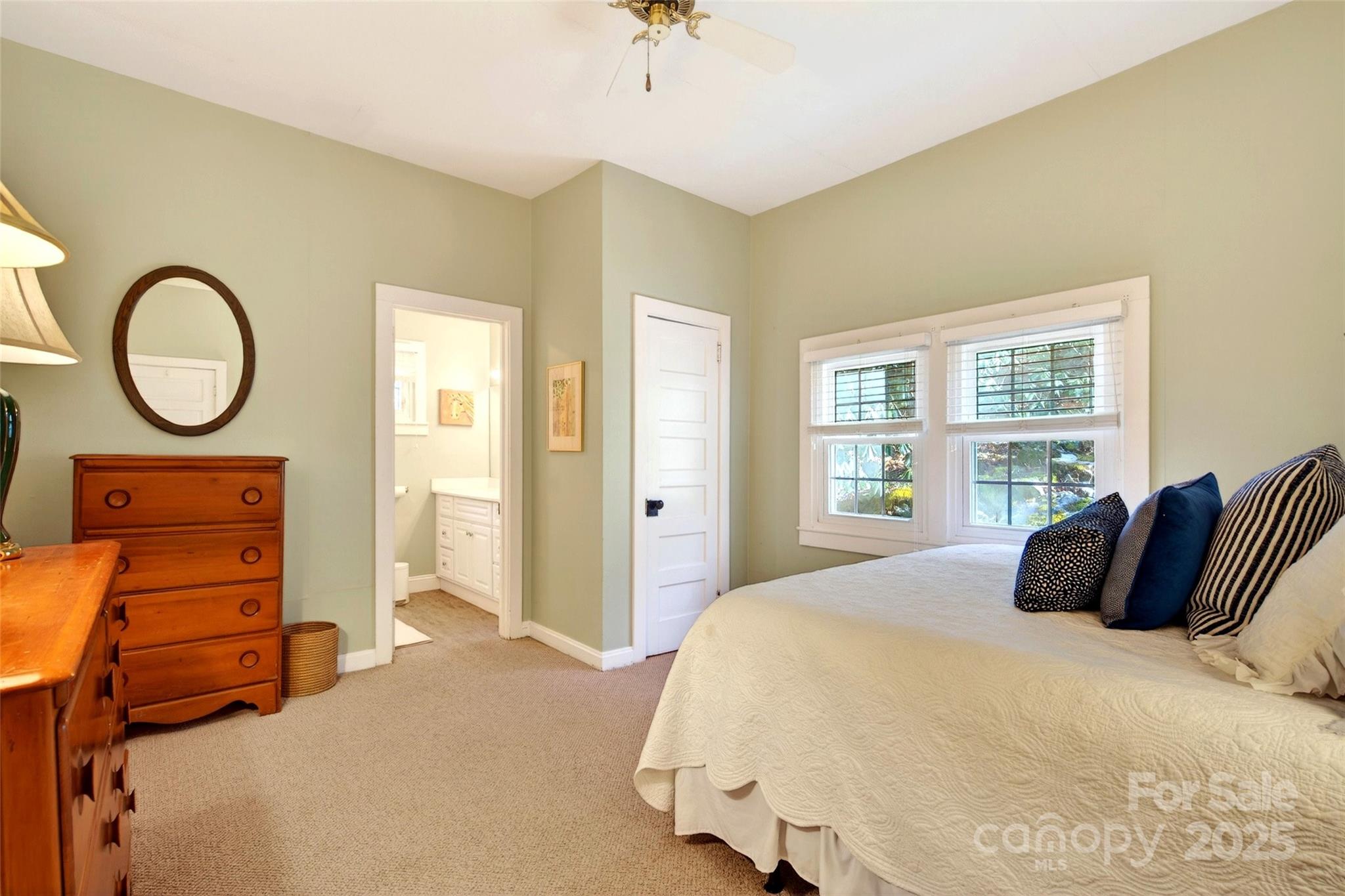 308 Texas Road Montreat, NC 28711 - Photo 20 of 48 a bedroom with a bed and a large window