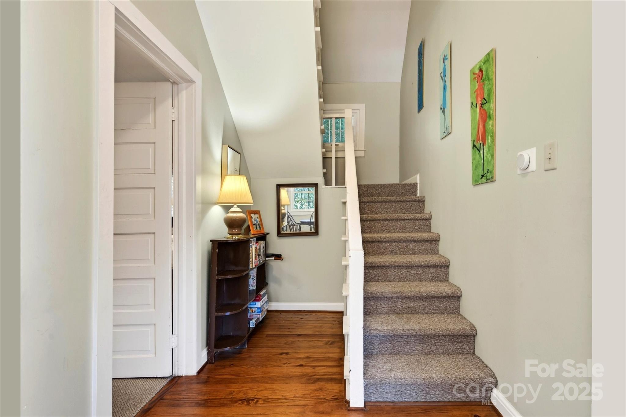 308 Texas Road Montreat, NC 28711 - Photo 24 of 48 a view of a hallway with wooden floor and staircase