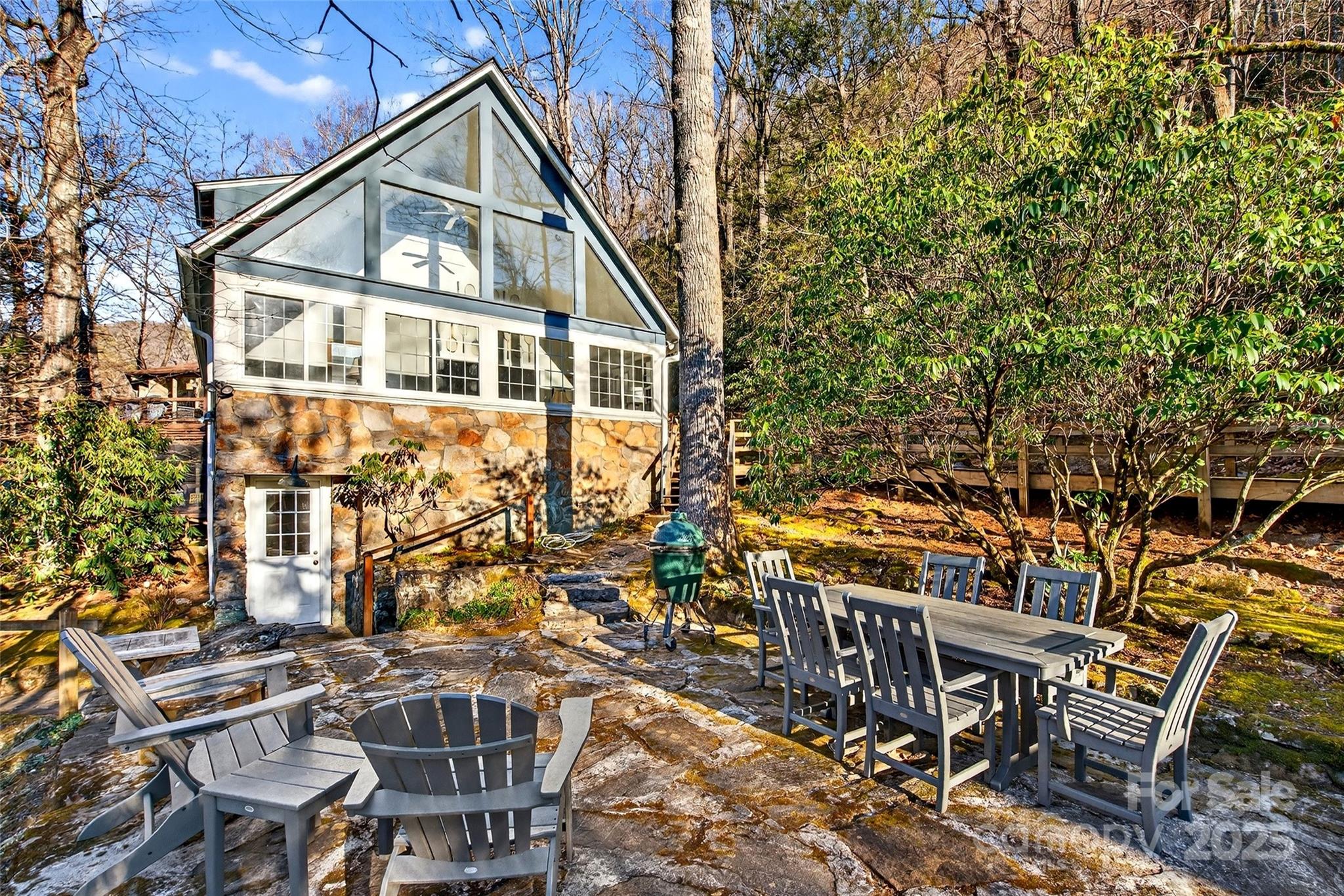 308 Texas Road Montreat, NC 28711 - Photo 3 of 48 a view of a house with backyard and sitting area