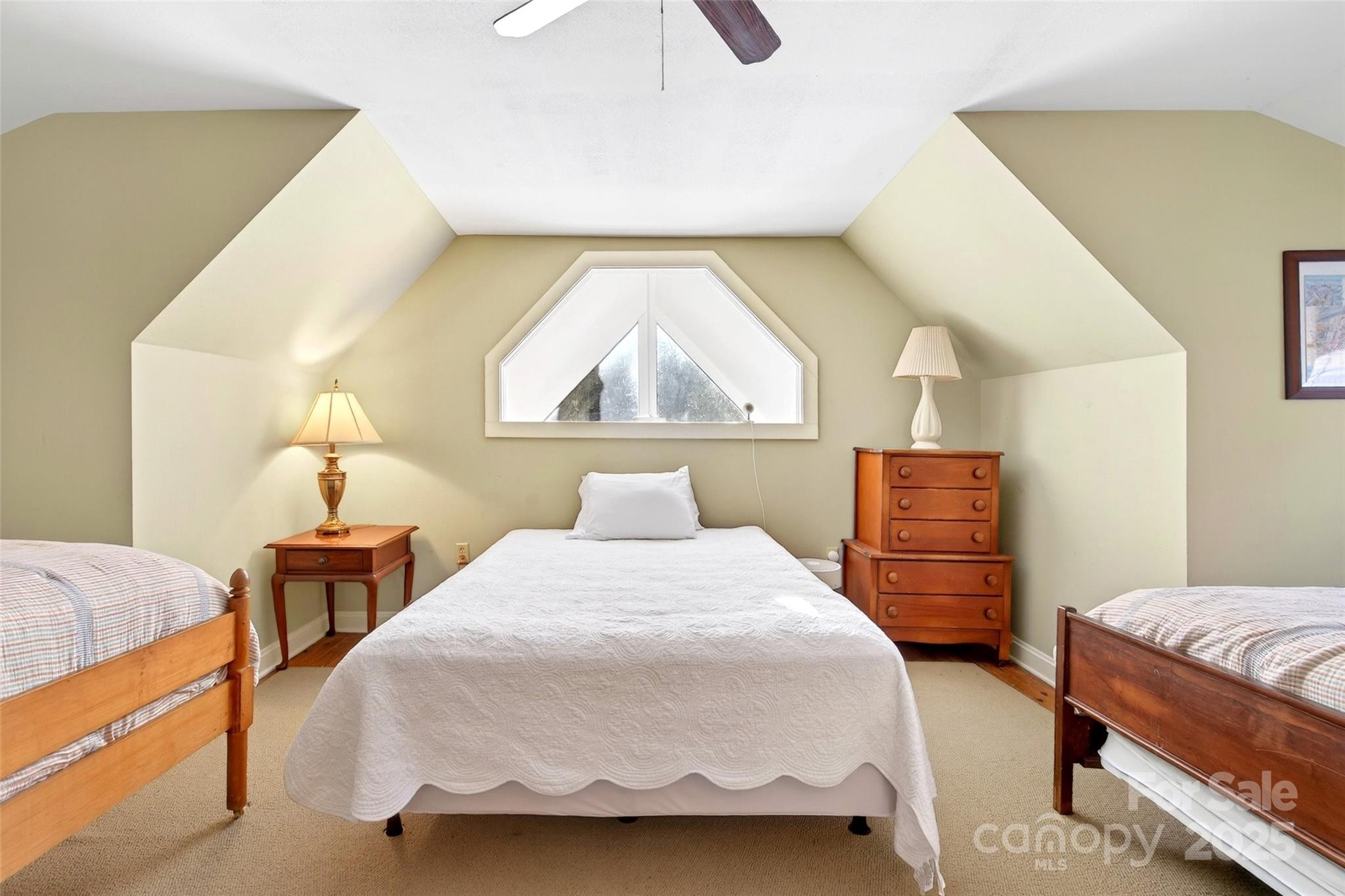 308 Texas Road Montreat, NC 28711 - Photo 31 of 48 a bedroom with a bed and wooden floor