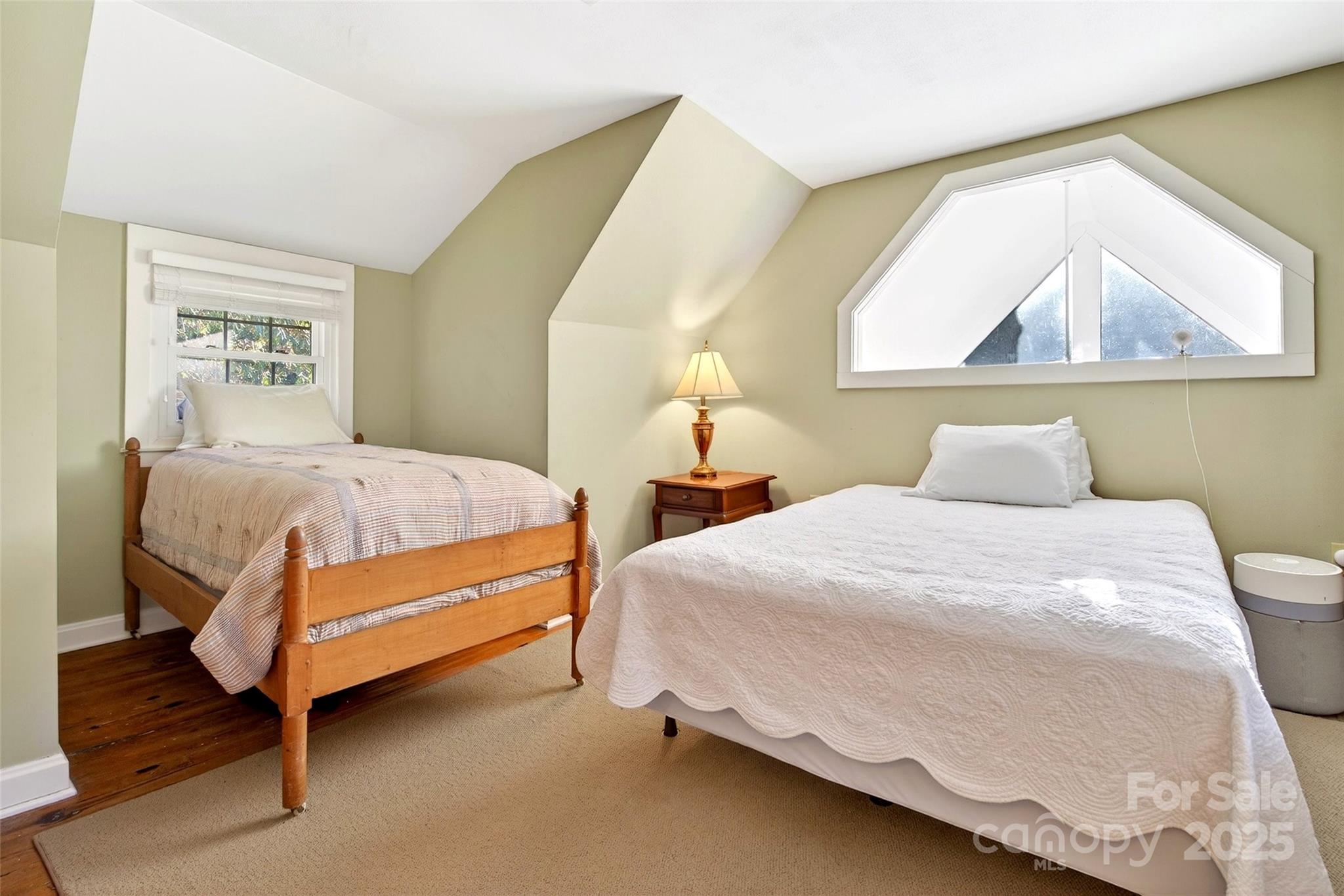 308 Texas Road Montreat, NC 28711 - Photo 32 of 48 a bedroom with a bed and window