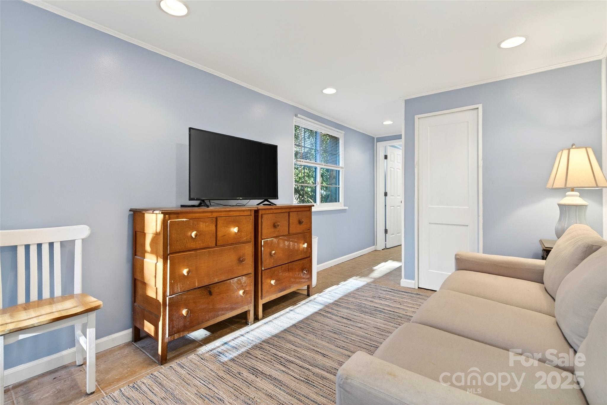 308 Texas Road Montreat, NC 28711 - Photo 39 of 48 a living room with furniture and a flat screen tv
