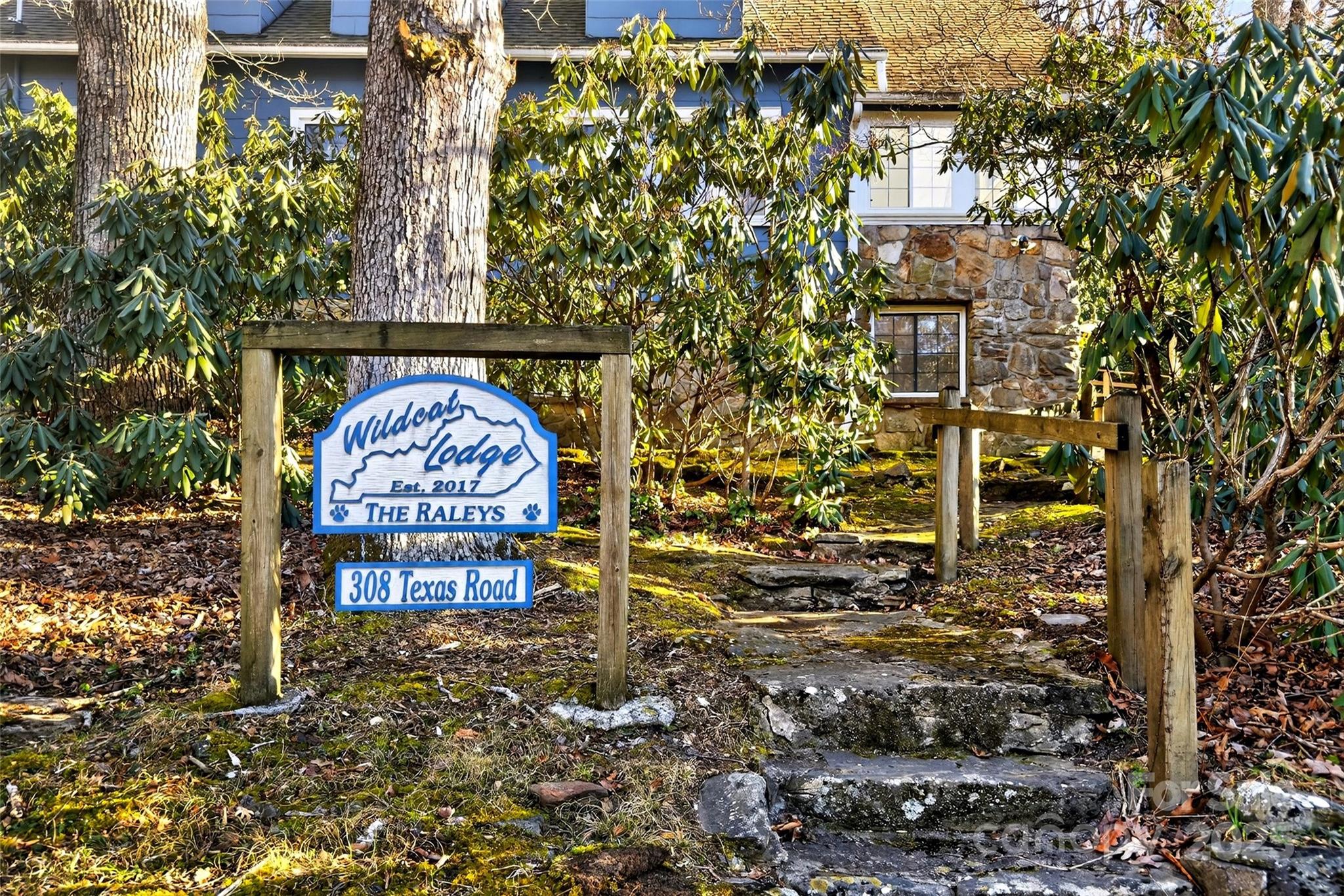 308 Texas Road Montreat, NC 28711 - Photo 44 of 48 a view of a pathway of a building with large tree
