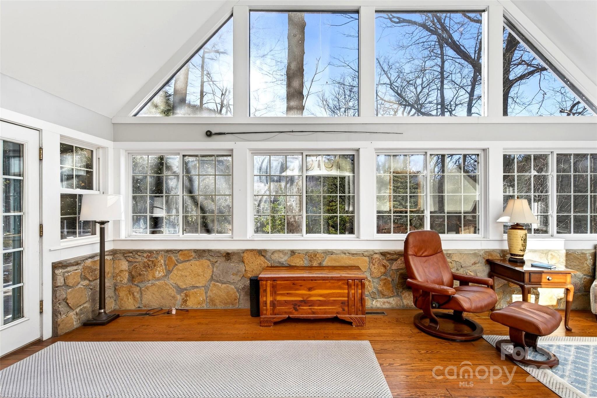 308 Texas Road Montreat, NC 28711 - Photo 7 of 48 a living room with furniture and large windows