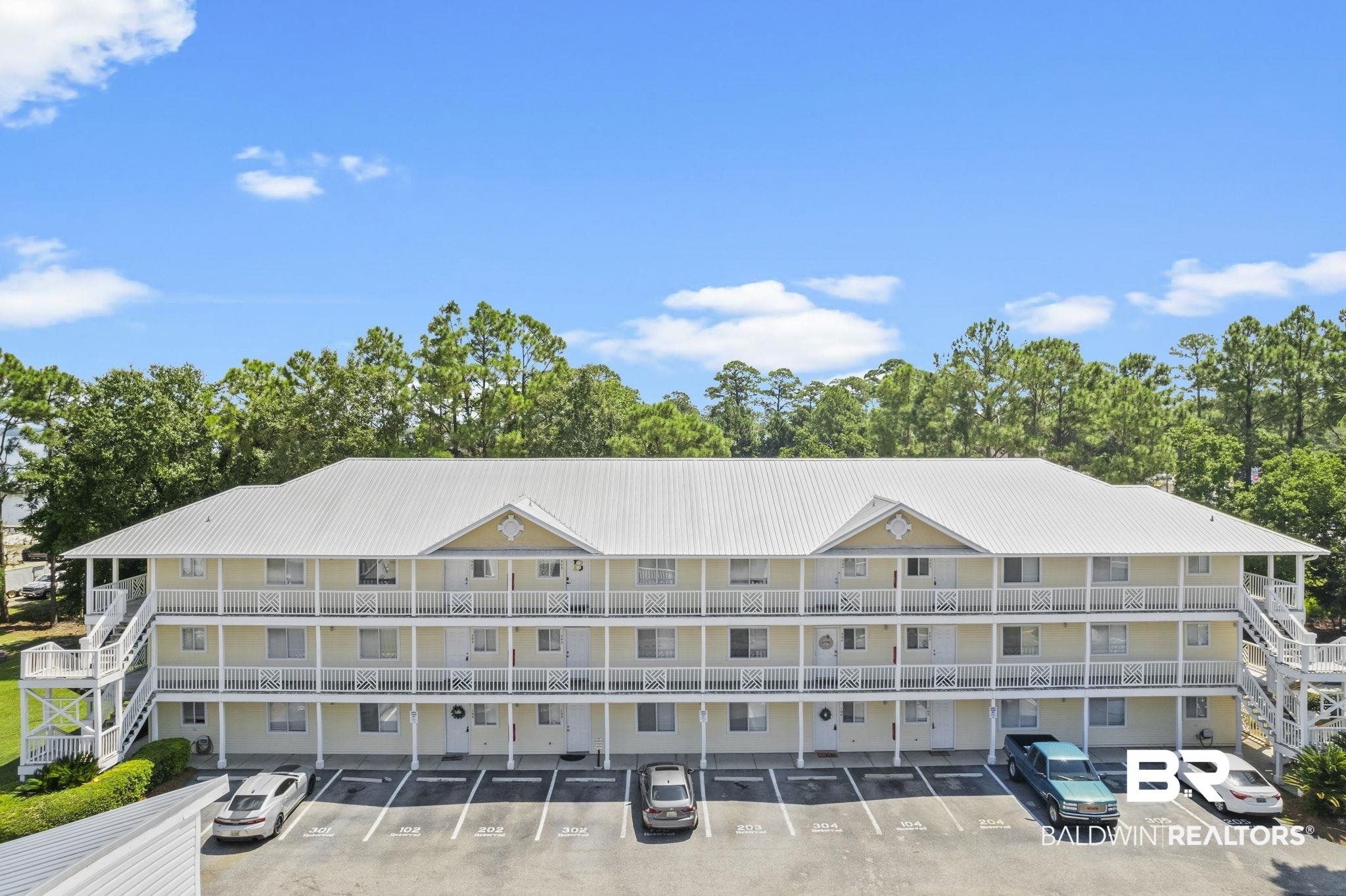 25957 Canal Road, Unit 302 Orange Beach, AL 36561 - Photo 3 of 26 View of front facade featuring a balcony