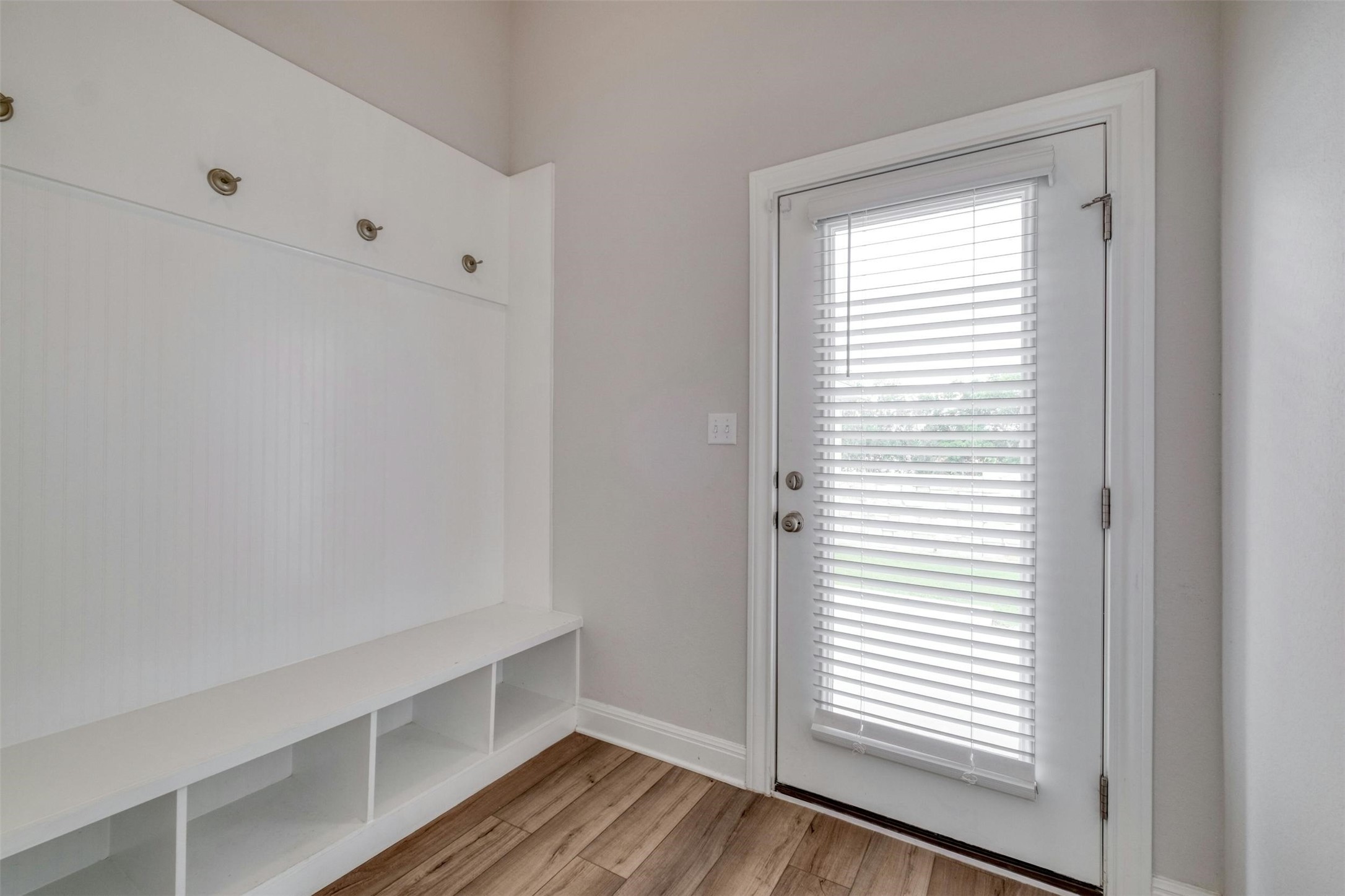 228 Rieber Road Kyle, TX 78640 - Photo 18 of 27 a view of room with window and wooden floor