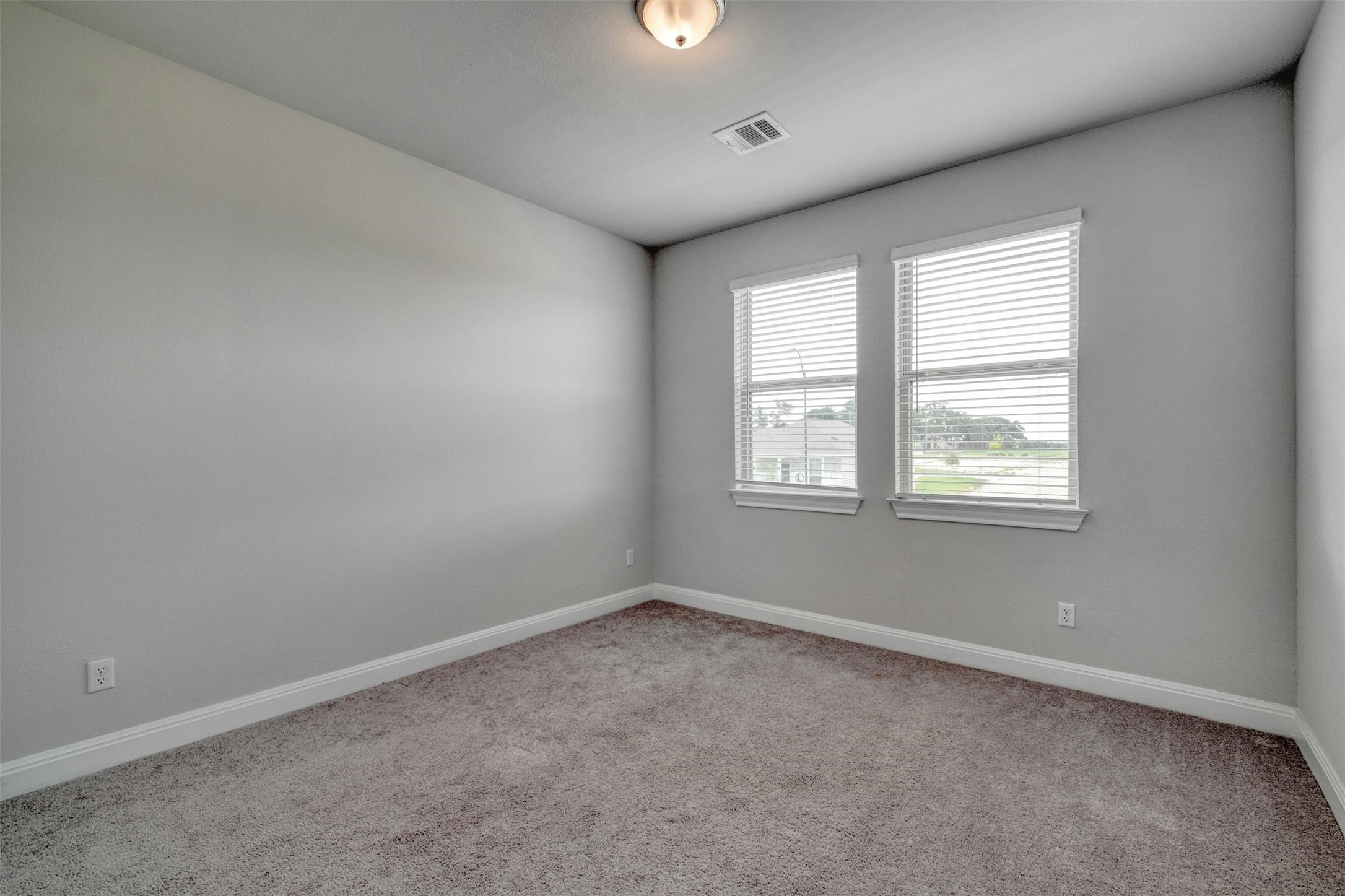 228 Rieber Road Kyle, TX 78640 - Photo 21 of 27 an empty room with a window