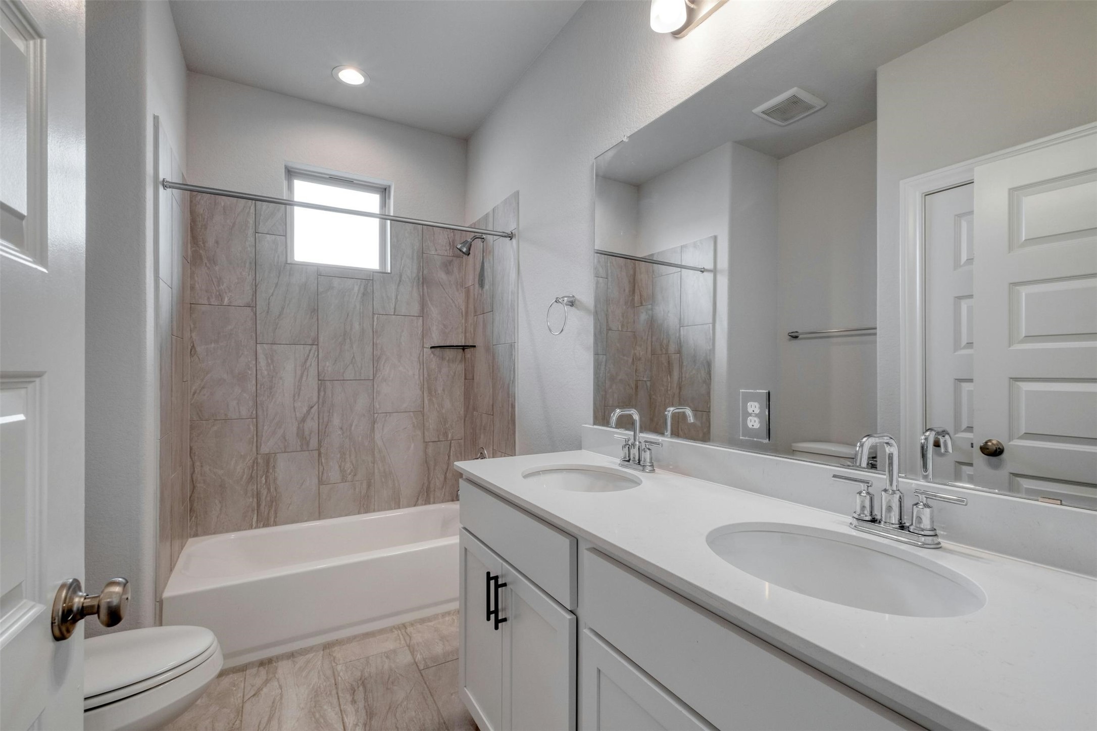 228 Rieber Road Kyle, TX 78640 - Photo 22 of 27 a bathroom with a sink double vanity granite tub and shower