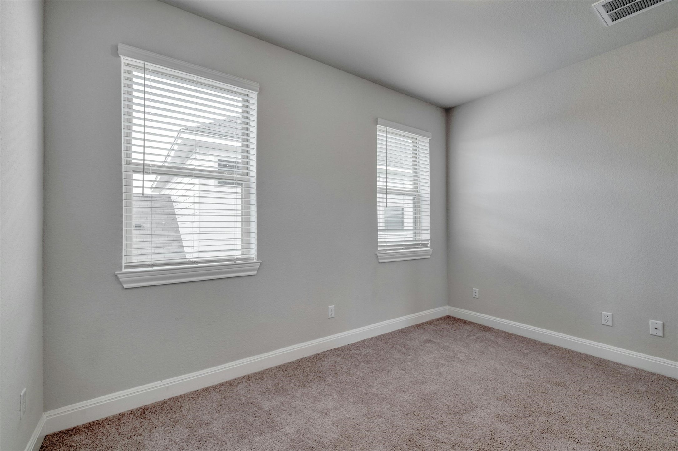 228 Rieber Road Kyle, TX 78640 - Photo 23 of 27 an empty room with a window