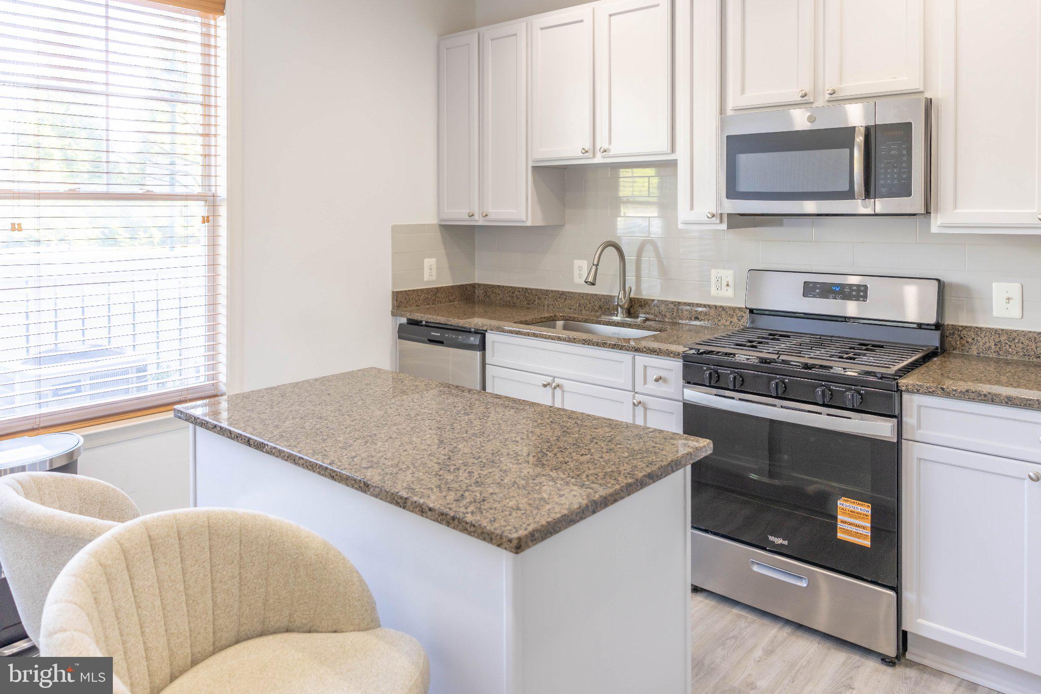 12824 Clarksburg Square Road, Unit 105 Clarksburg, MD 20871 - Photo 36 of 96 Modern kitchen with sleek finishes.