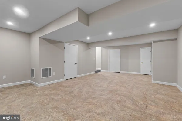 an empty room with a natural light