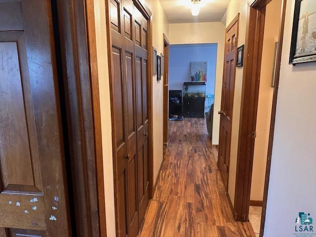 38 Locust Drive Babbitt, MN 55706 - Photo 14 of 29 Corridor with wood finished floors